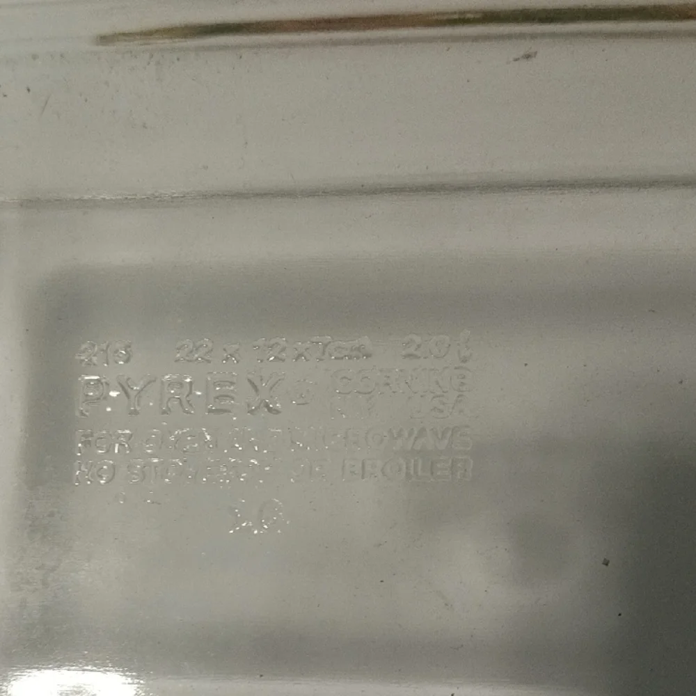 Pyrex Glass Baking Dish with Woven Basket 9 By 5 Inches